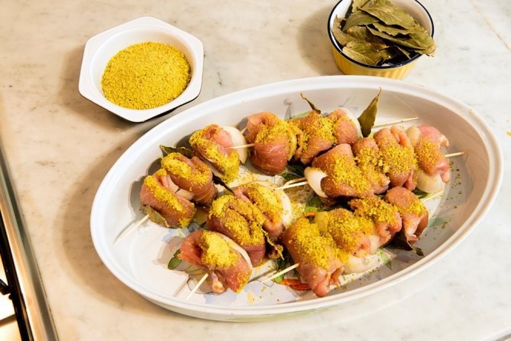 Lunch or Dinner & Cooking Demo at a Local Home in Taormina