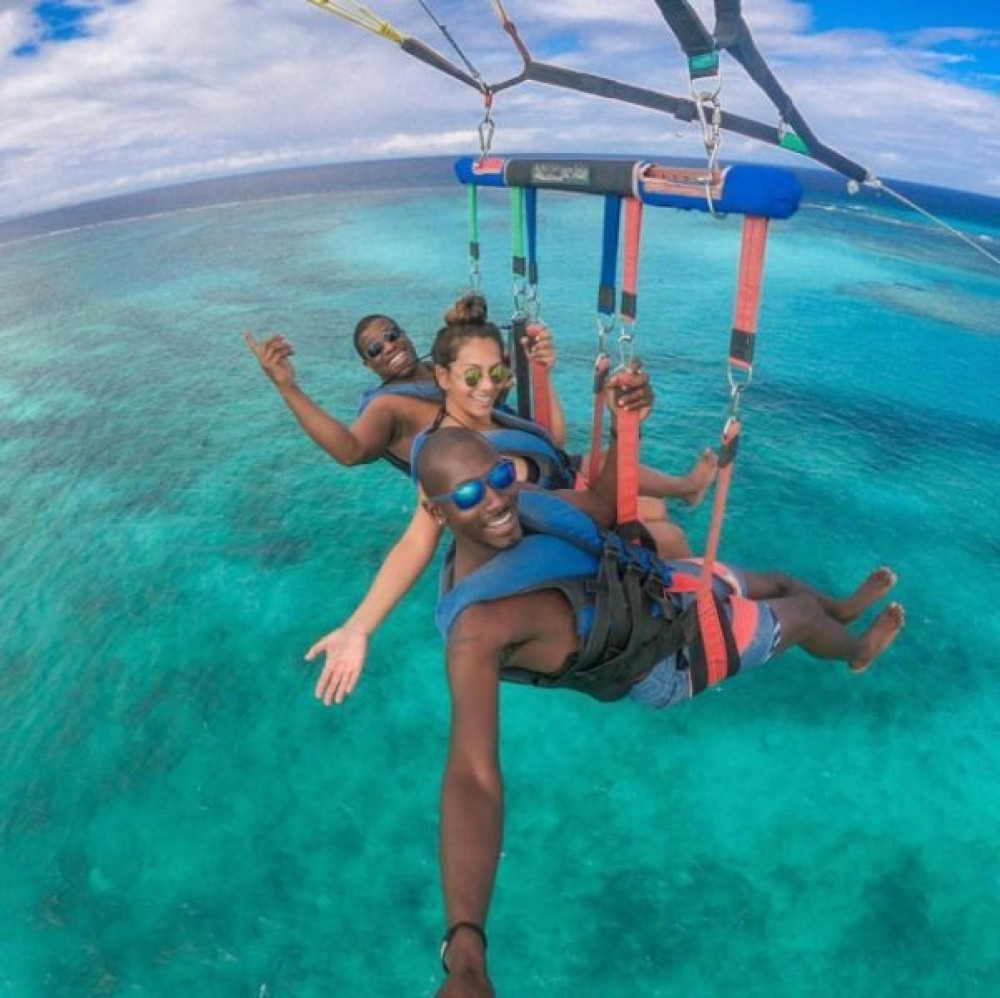 Small Group Parasailing over Providenciales Reef in Grace Bay