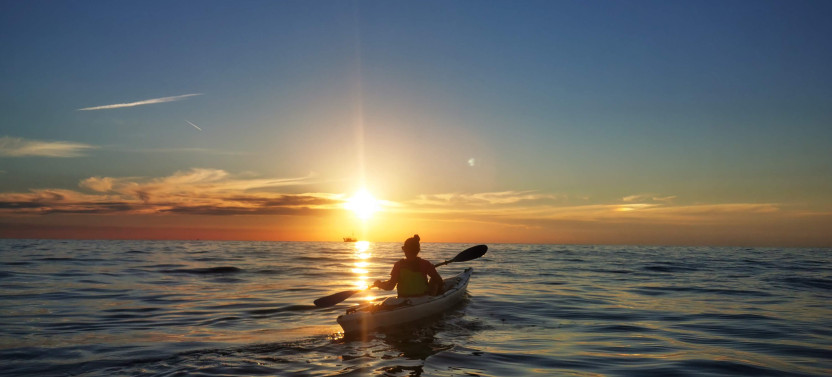 Sunset Sea Kayaking Tour with Historical Coastline & Dolphin Views in Poreč