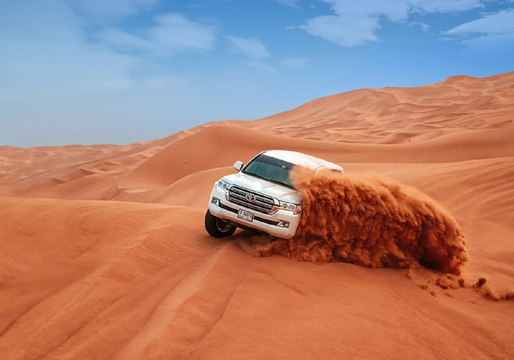 Dubai Morning Desert Safari with Sandboarding & Camel Ride