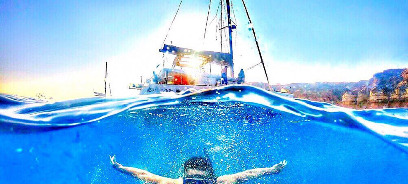 Classic Daytime Sailing Catamaran Cruise with Meals, Drinks & Transfers