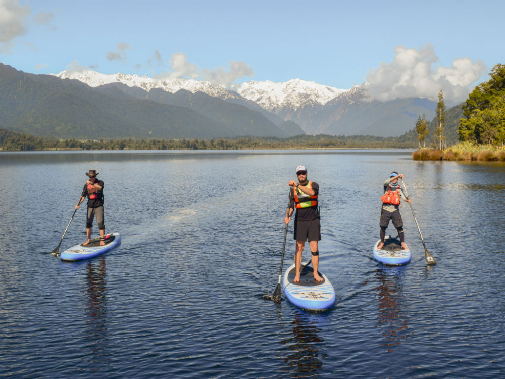 Stand Up Paddleboard & Boat Adventure Across Lake Mapourika Franz