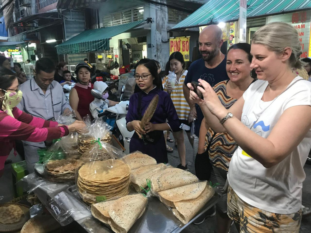 Saigon Scooter Food Tour By Night With An Ao Dai Guide Ho Chi Minh