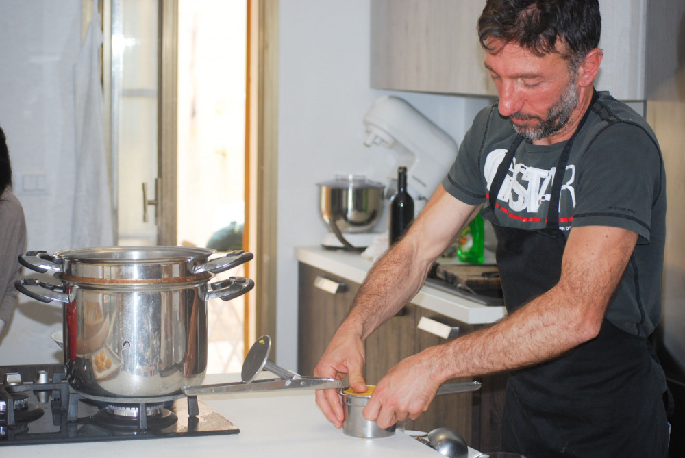 Prepare Fresh Bolognese In A Pasta Shop With A Professional Pasta Maker