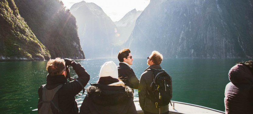 6:30 am: Milford Sound Glass Top Bus Tour & Nature Cruise w. Picnic Lunch