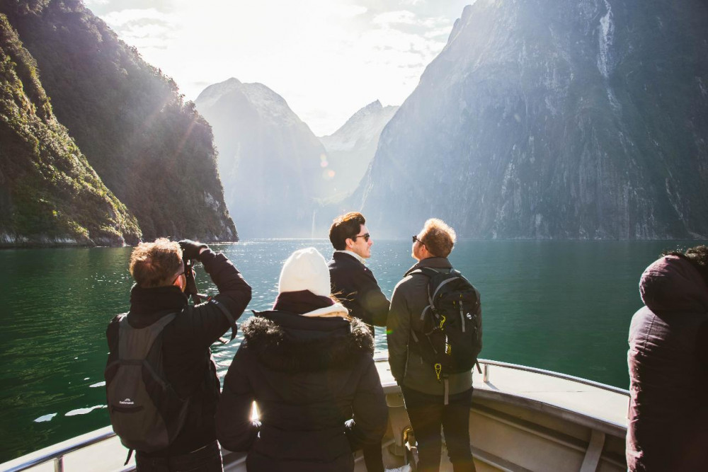 6:30 am: Milford Sound Glass Top Bus Tour & Nature Cruise w. Picnic Lunch