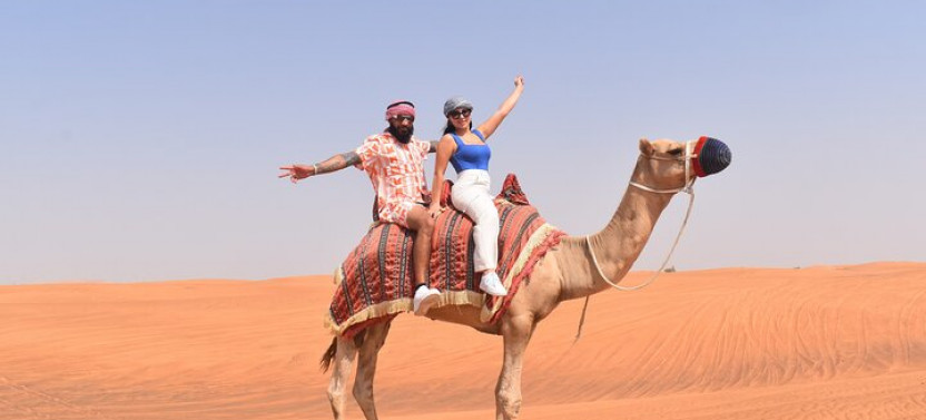 Exclusive Desert Excursion Camel Ride Sandboard & Buffet BBQ Dinner