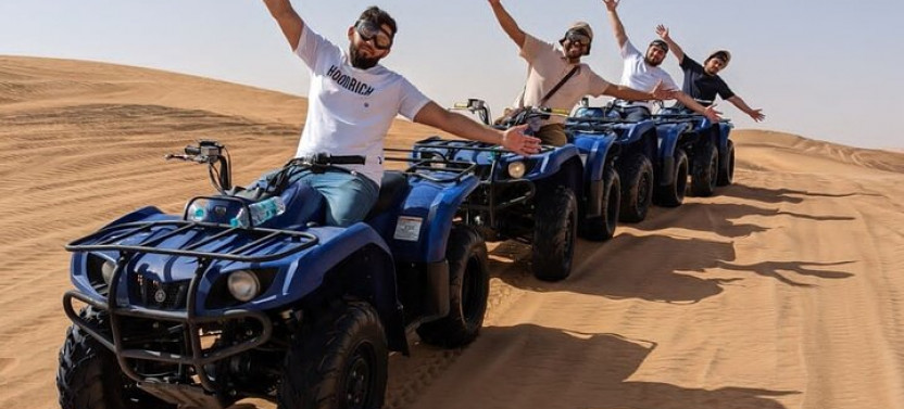 4 Hours Desert Tour with Quad Bike Camel Ride & Sandboard
