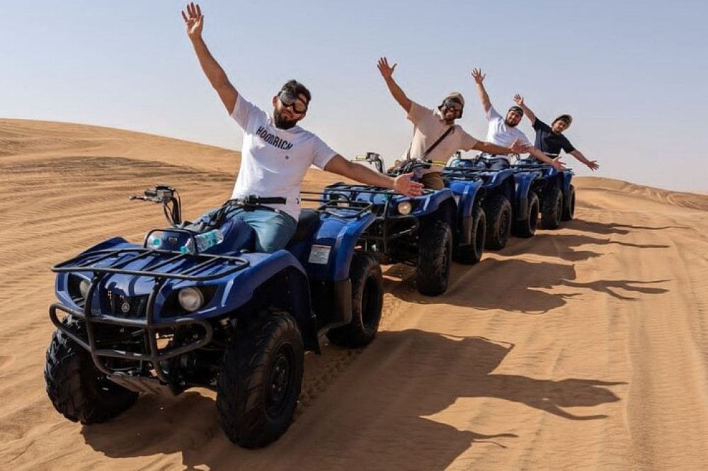 Premium Desert Excursion 1 Hour Quad Bike Camel Ride BBQ Dinner