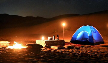 A picture of Dubai Overnight Safari with Camping, Camel Riding, Henna and More