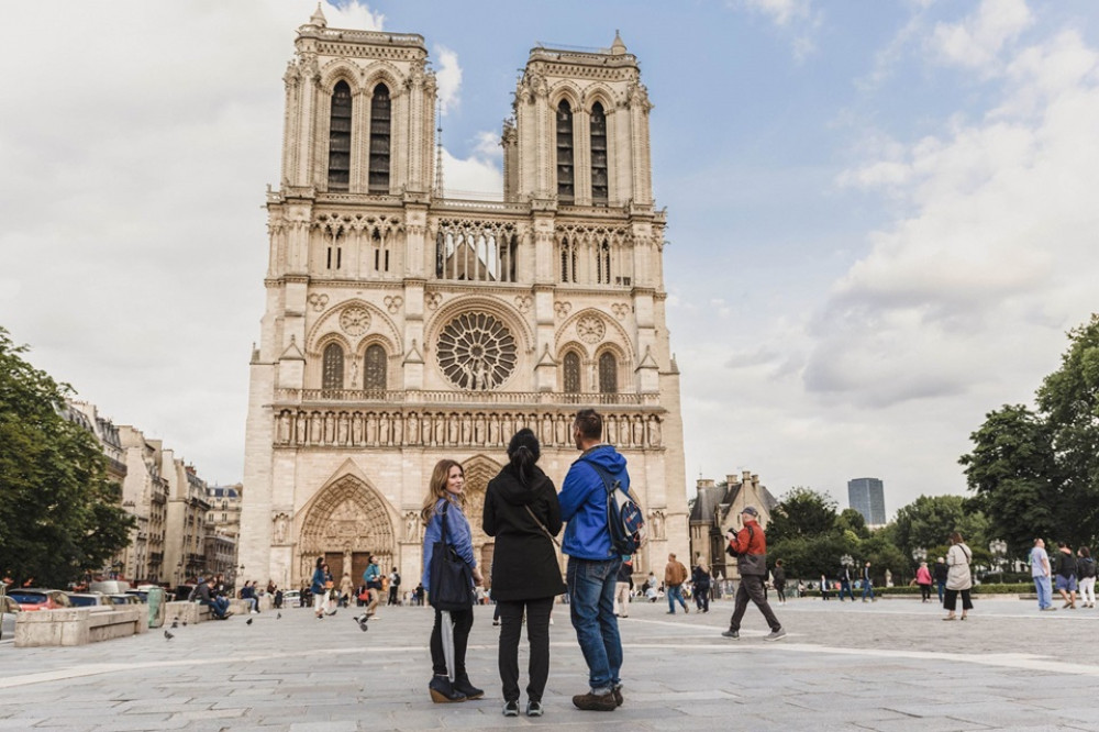 Inside Notre Dame Tour with Small Group City Stroll