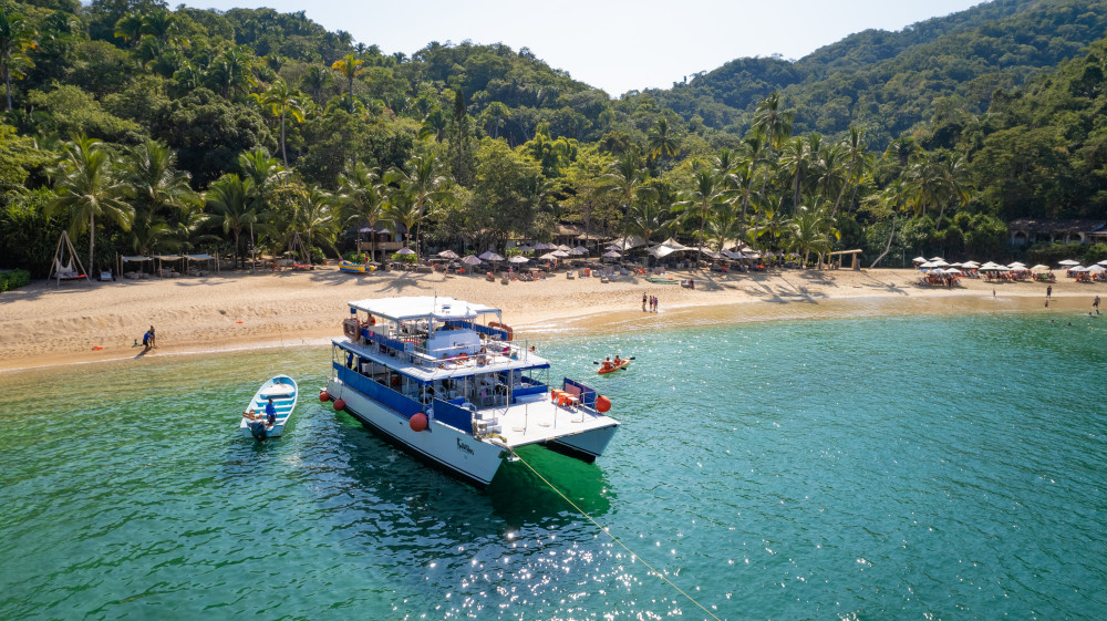 Majahuitas Beach Day with Round Trip Catamaran Ride