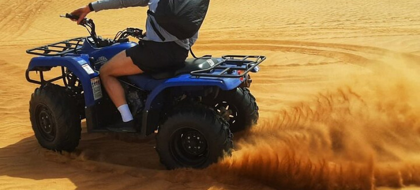 Dubai: Quad Bike Safari, Camels, & Camp with BBQ Dinner