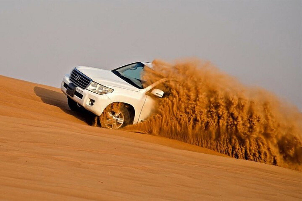 Desert Safari, Quad Bike, Sand Boarding, Camel Ride, with BBQ Dinner