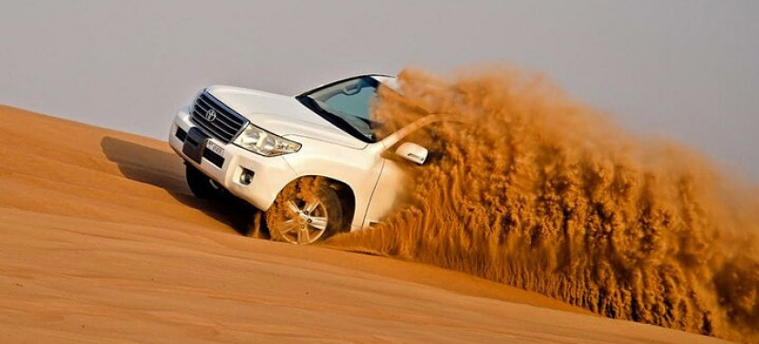 Dubai: Jeep Desert Safari, Camel Ride, and Quad Bike Tour