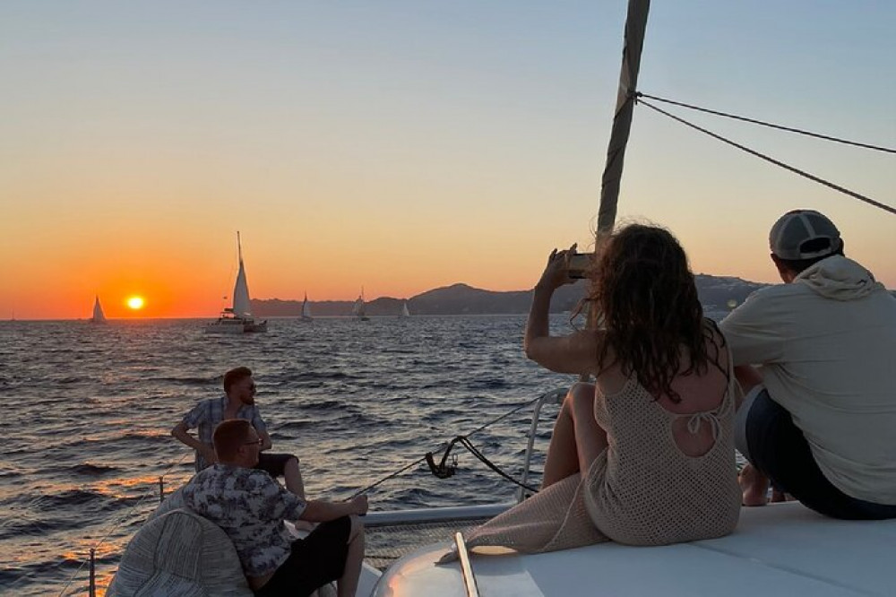 Santorini Sunset Catamaran Cruise with Greek Dinner, BBQ, Drinks & Transfer