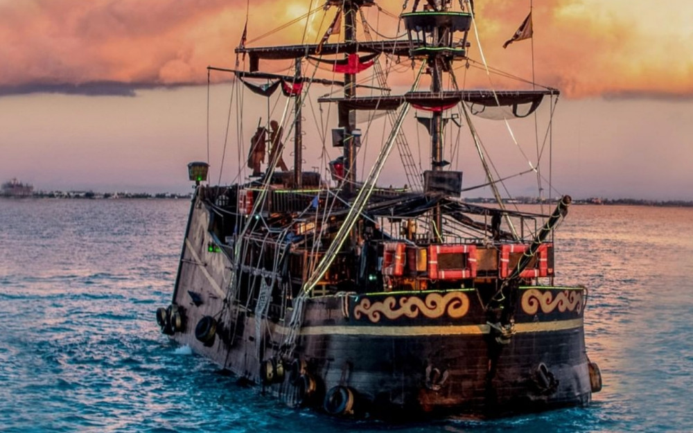 Show and Dinner at Captain Hook Surf & Turf option