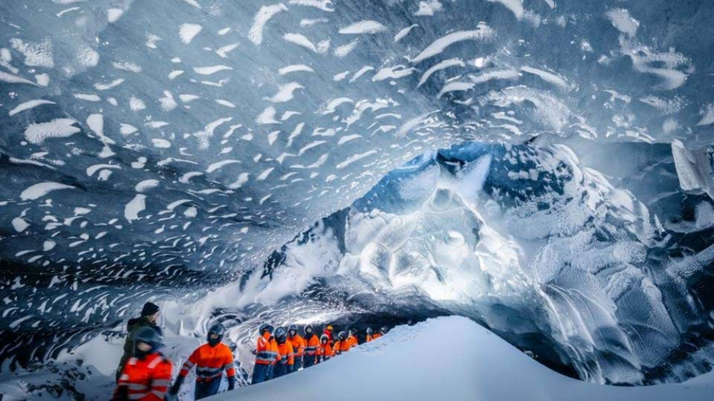 Askur Ice Cave in a Mountain Truck