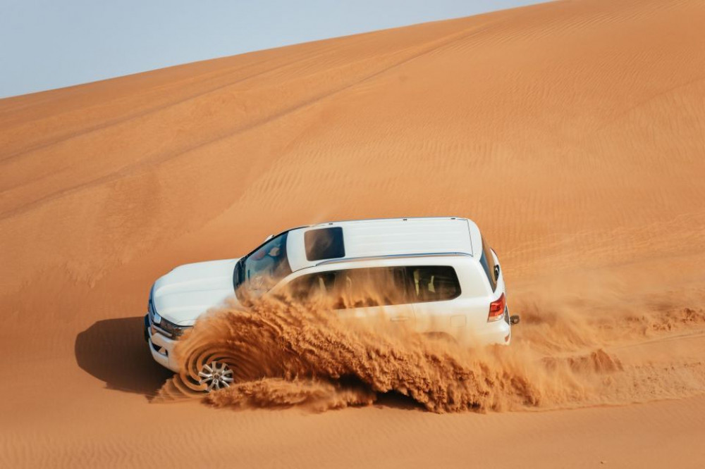 Dubai Evening Desert Safari with Camel Ride, Red Dunes, BBQ Dinner