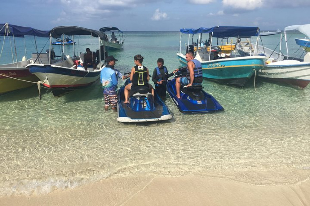 Jet Ski Adventure Plus Reef Snorkel By Boat and West Bay Beach Break