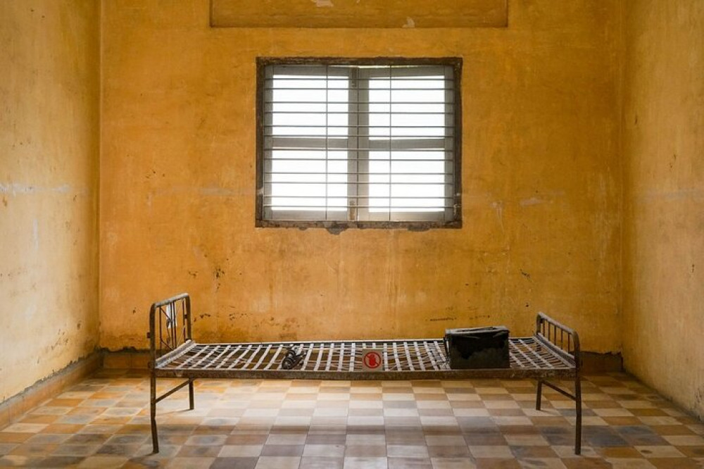 Tuol Sleng Museum and Russian Market Half-day Tour