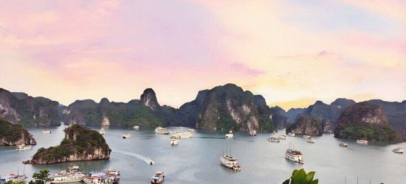 Cruise along Ha Long Bay and visit Surprising Cave and Titop Island