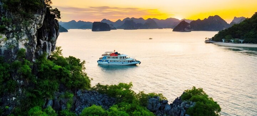 Cruise along Ha Long Bay and visit Surprising Cave and Titop Island