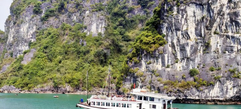 Cruise along Ha Long Bay and visit Surprising Cave and Titop Island