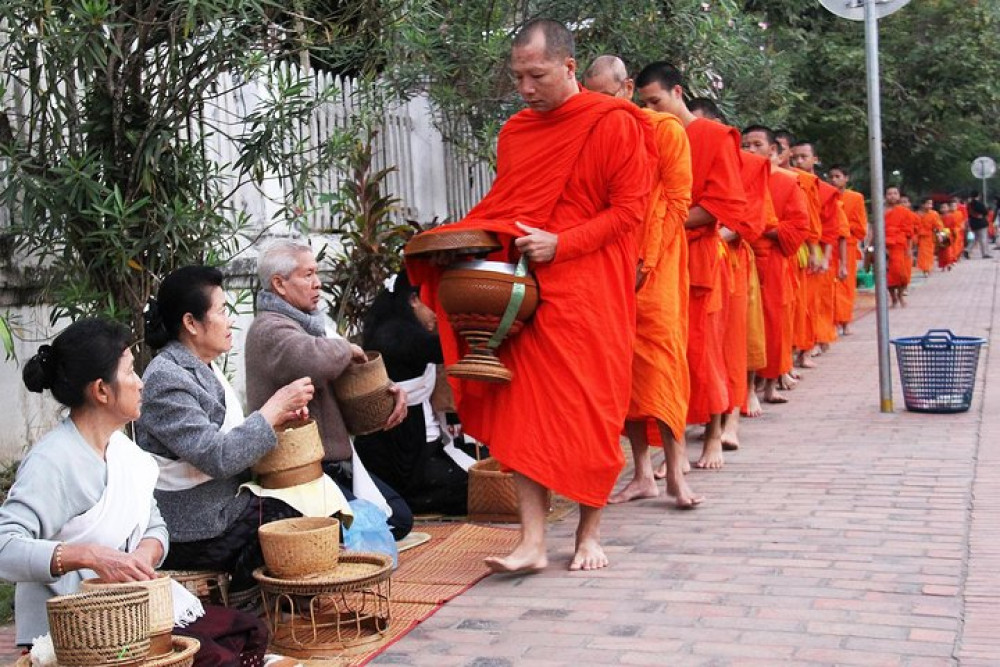 Luang Prabang Early Morning Alms Giving And Wet Market