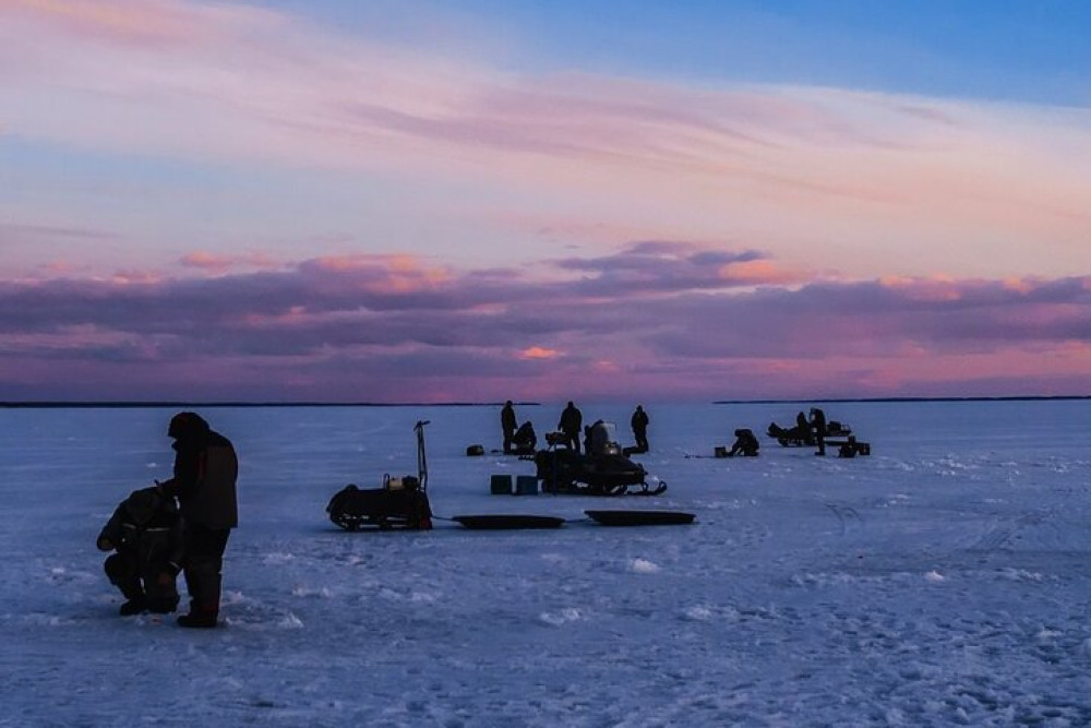 Lapland Snowmobile Adventure and Ice Fishing Experience