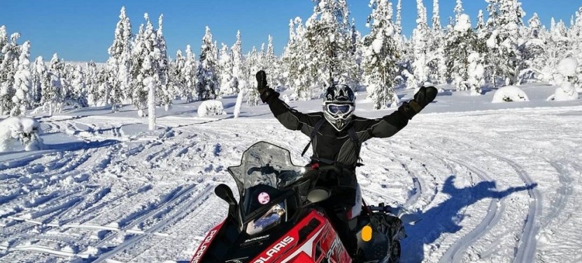 Santa Claus and Reindeer Experience by Snowmobile & Sleigh