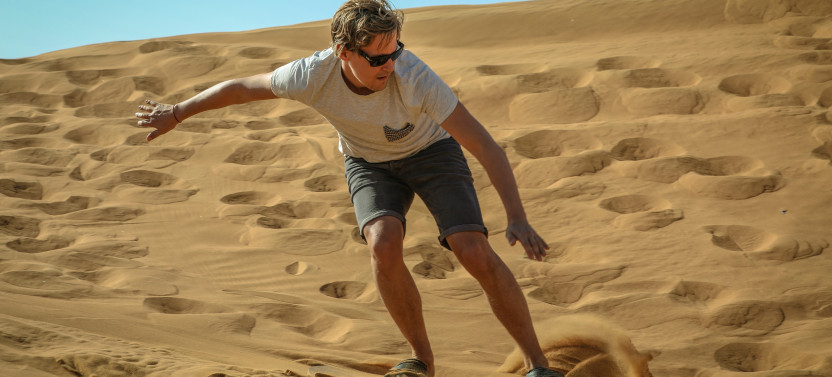 Premium Sunset Camel Trek & Red Dunes Safari w. BBQ at Al Khayma