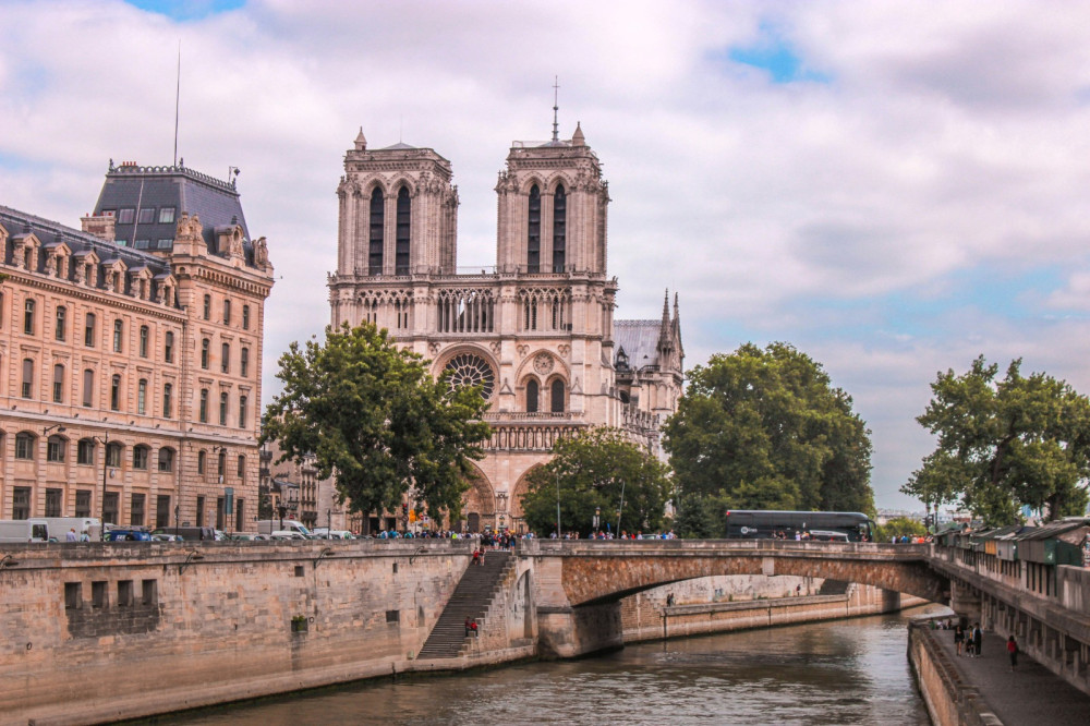 Eiffel Tower by Stairs, Seine Cruise & Notre Dame Visit w/ Louvre Option