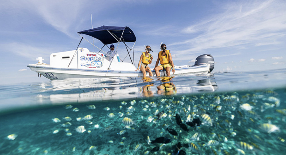 Cancun Package: Snorkeling, Parasailing, El Meco Ruins + Transportation