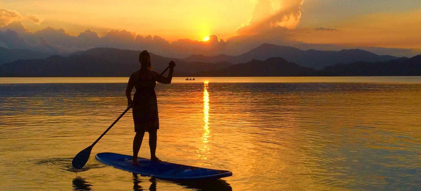 Sunset Paddleboard and Bioluminescence Kayak Tour