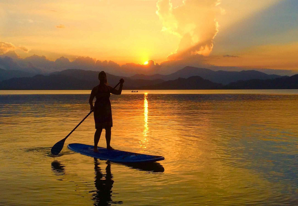 Sunset Paddleboard and Bioluminescence Kayak Tour