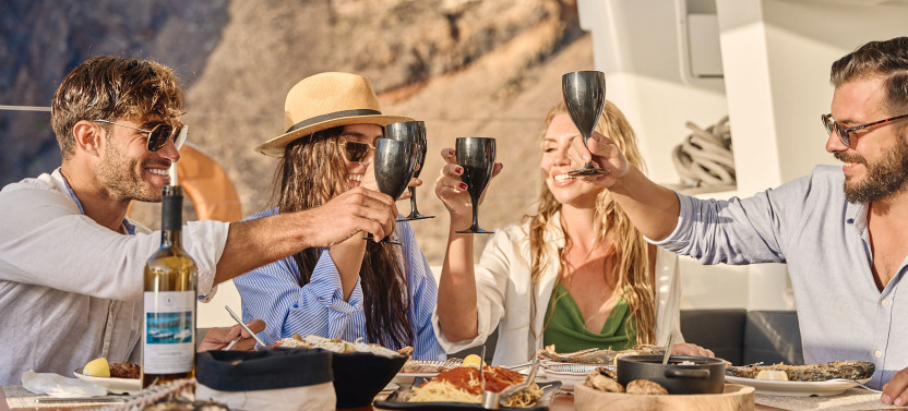 Private Sunset Catamaran Cruise with BBQ, Open Bar & Exclusive Transfers