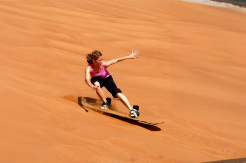 Dubai Desert Safari with Quad Bike, Sand Boarding & BBQ Dinner