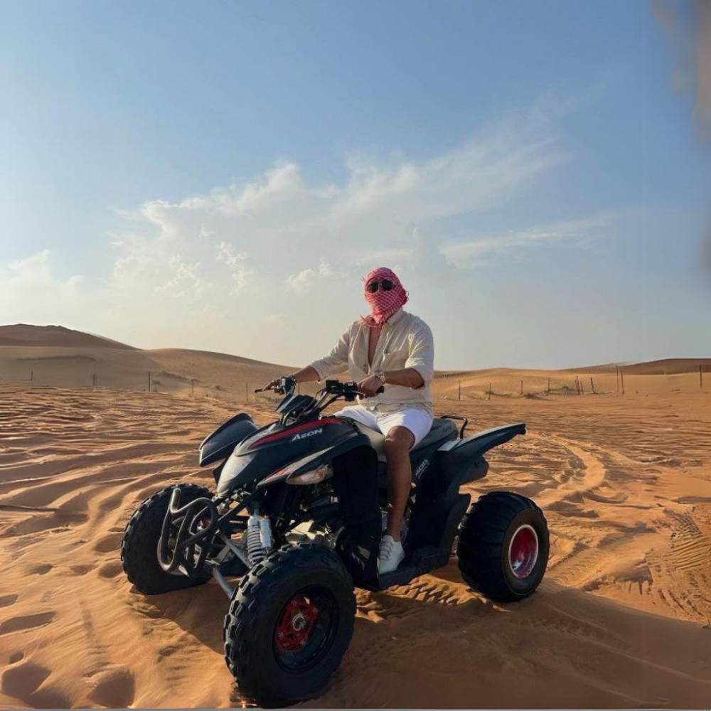 Dubai Dune Bashing Tour With Quad Bike, Sandboarding, Camel Ride