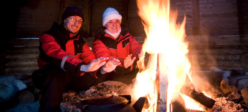 Snowmobiles and Huskies in Lapland