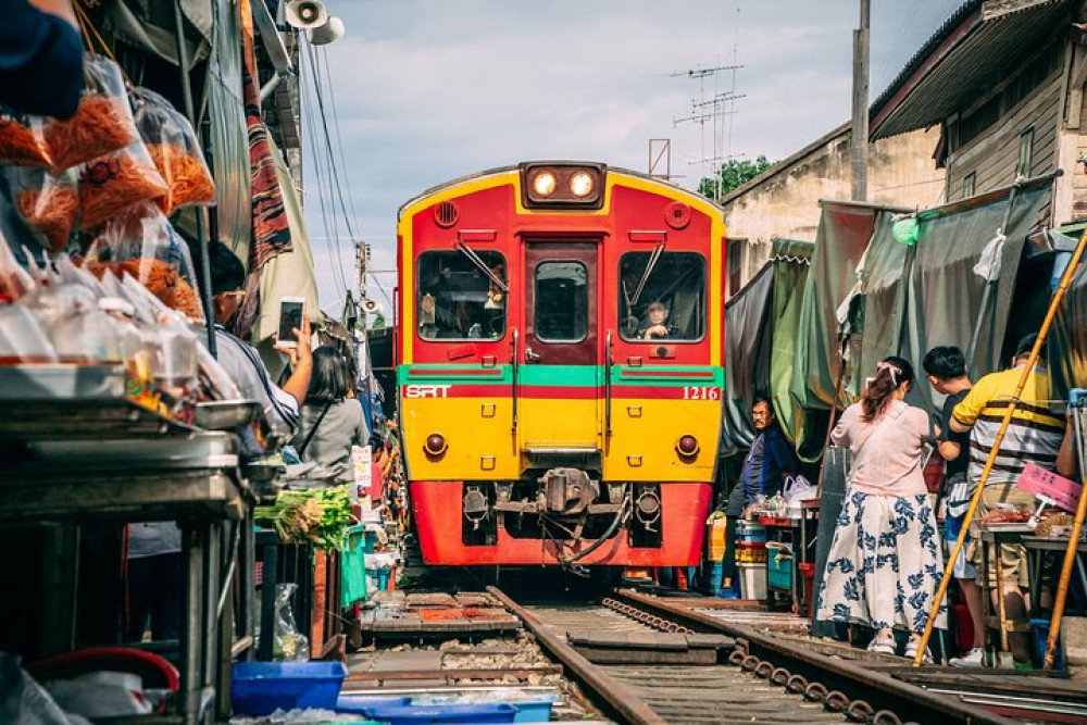 Maeklong Railway Sugar Palm Factory and Floating Market Day Tour