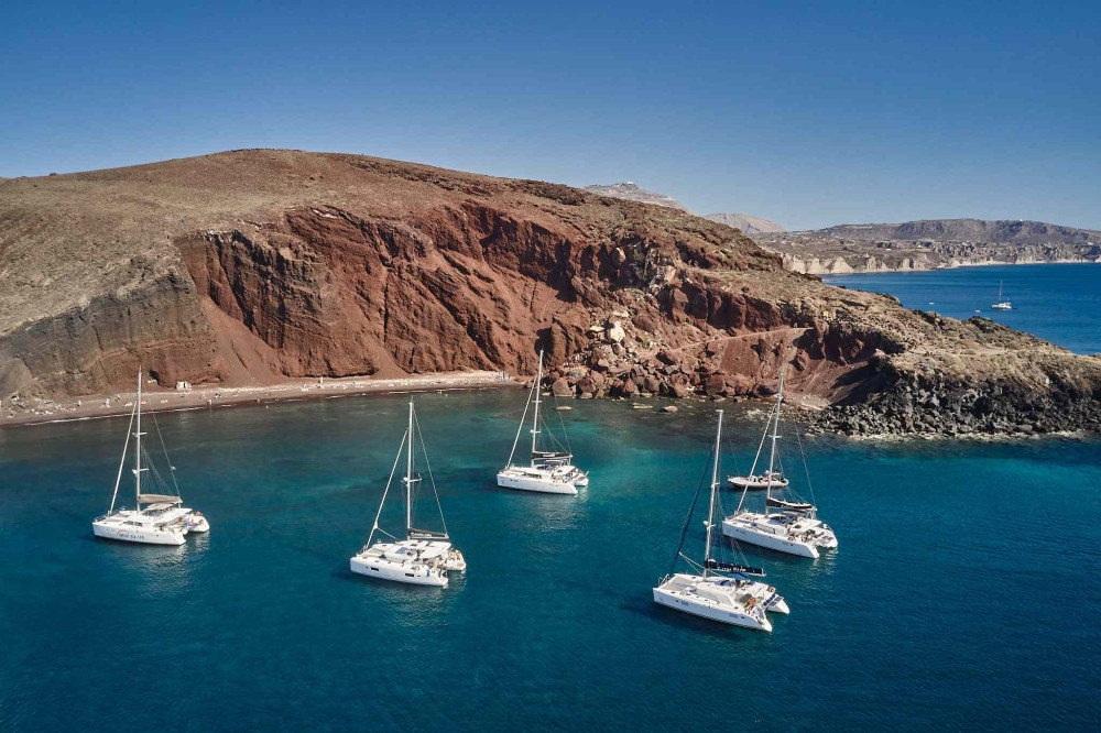 Daytime Sailing Cruise in Santorini with BBQ, Open Bar, Exclusive Transfers