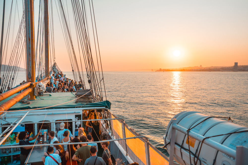Lisbon’s BIGGEST Sunset Boat Party — Cruise with Music & Drinks