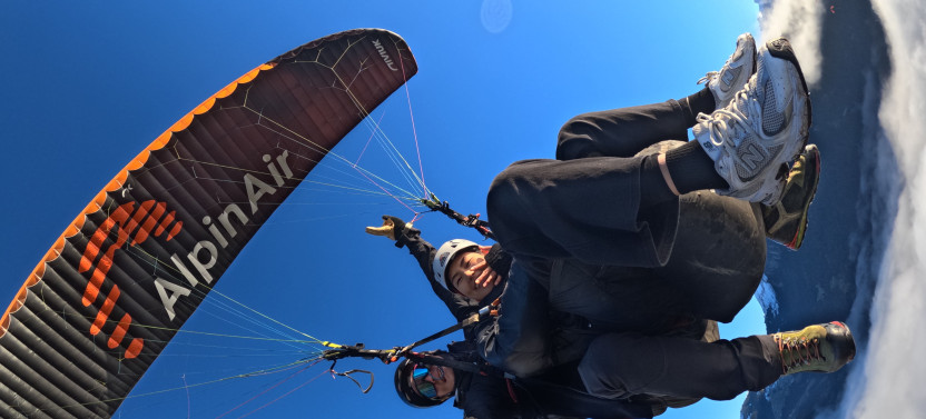 Tandem Paragliding Flight Over Interlaken and Swiss Alps Peaks