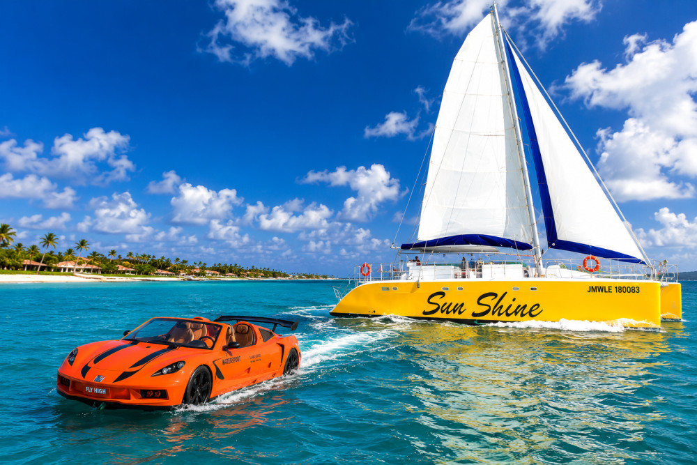 Private Catamaran cruise with JET Car, Ricks Cafe & Snorkeling