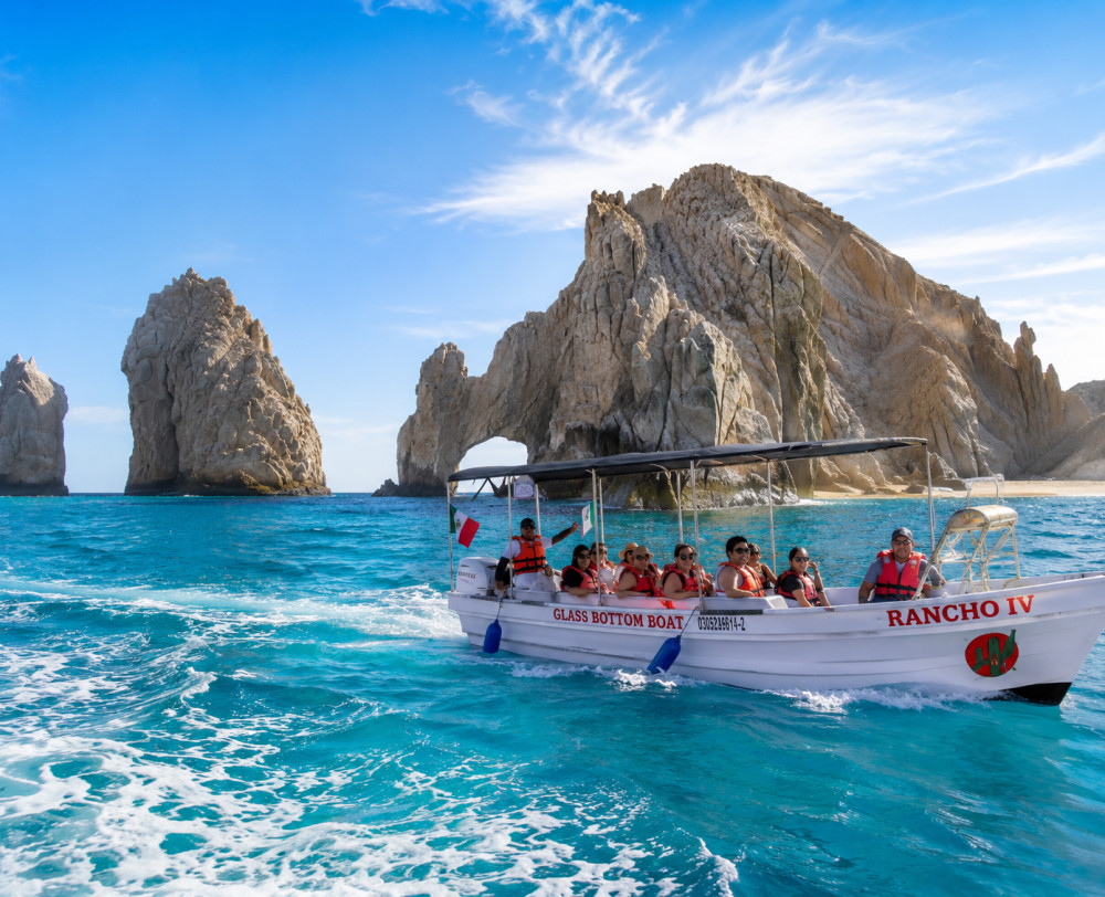 Arch, Lover's beach with Glass Bottom Boat .