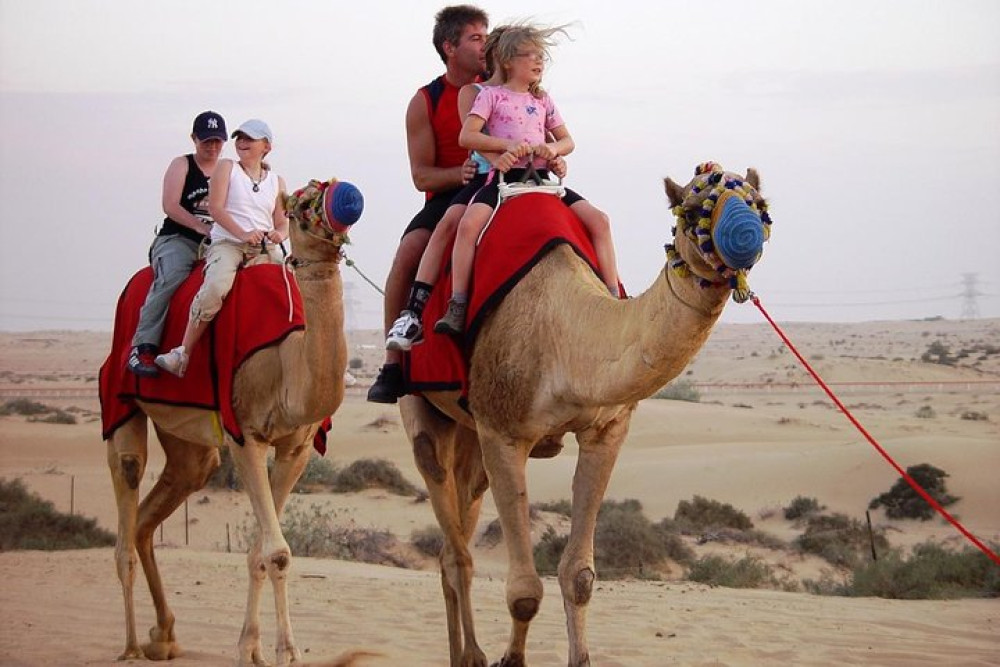 Morning Dubai Desert Safari with Camel Ride & Sandboarding