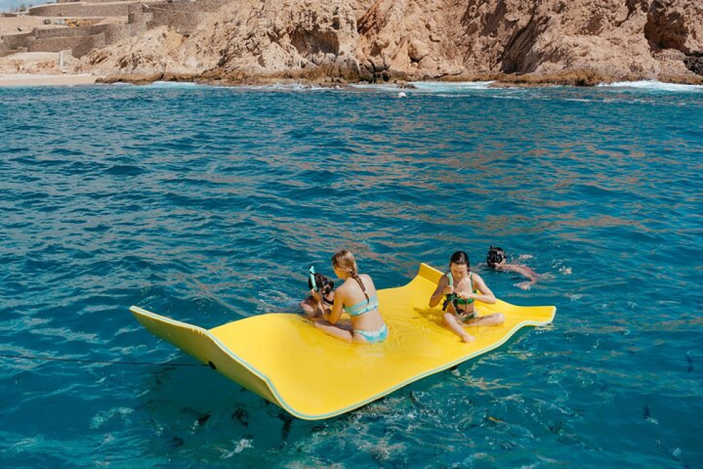 Los Cabos Private Catamaran Cruise with Snorkeling & Open Bar