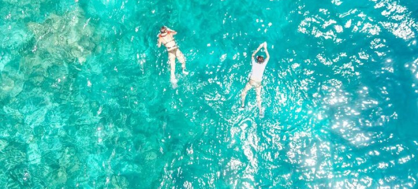 Zanzibar Private Full Day Catamaran to Mnemba Atoll Open Bar