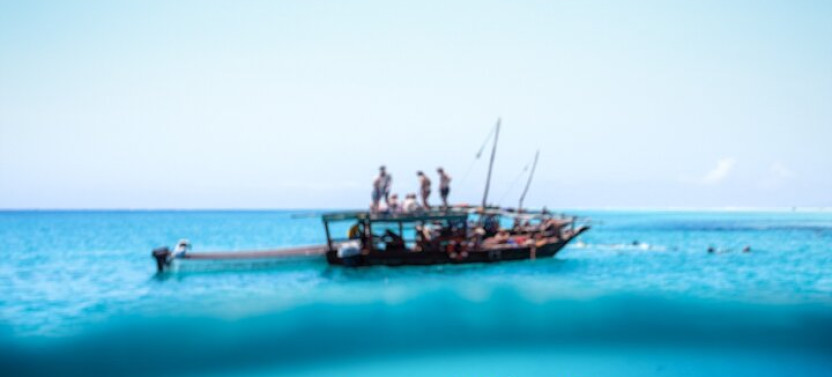 Mnemba Island Full Day Dhow Snorkeling Trip with Drinks and Lunch